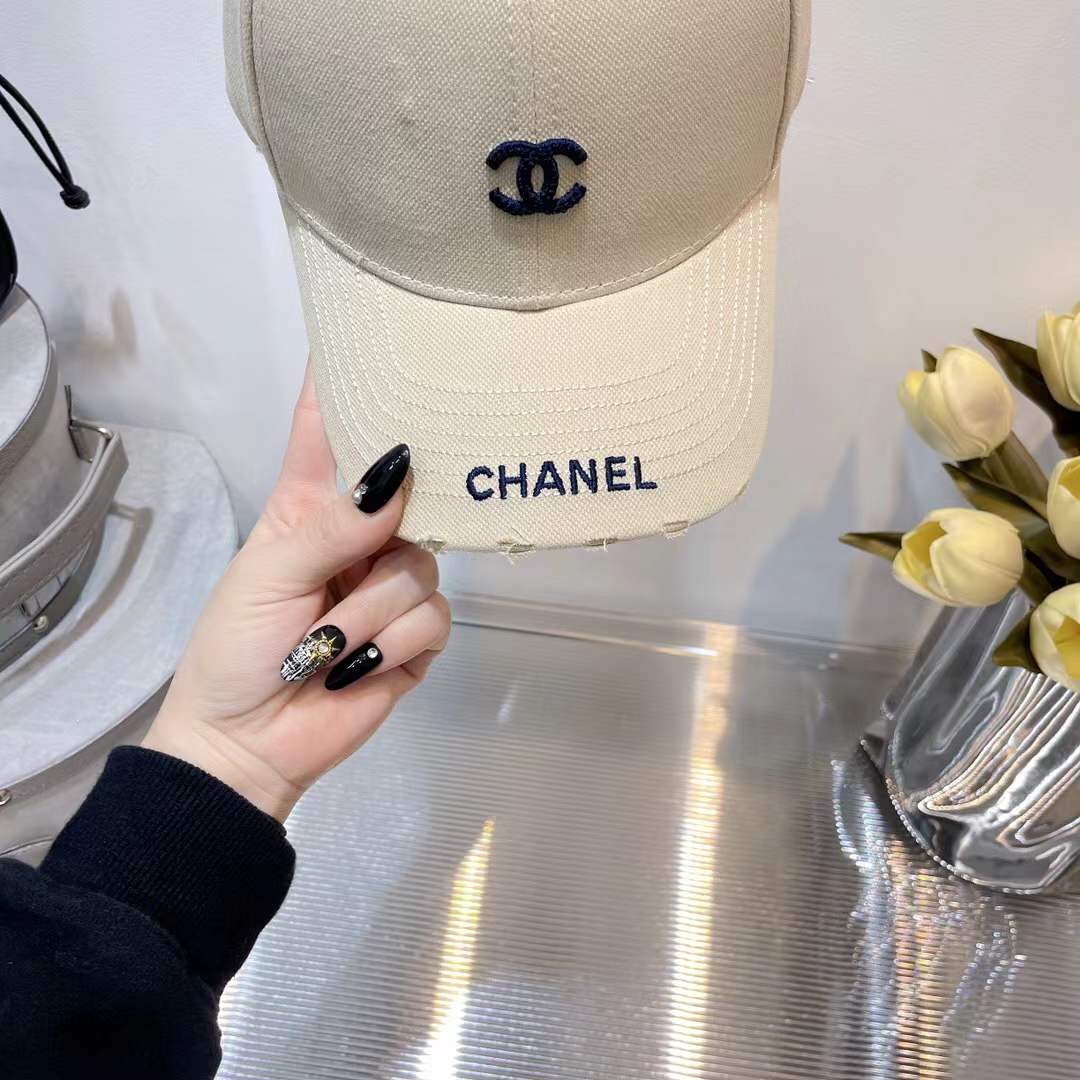 Chanel baseball cap embroidered black CC logo on the front and "CHANEL" text on the brim