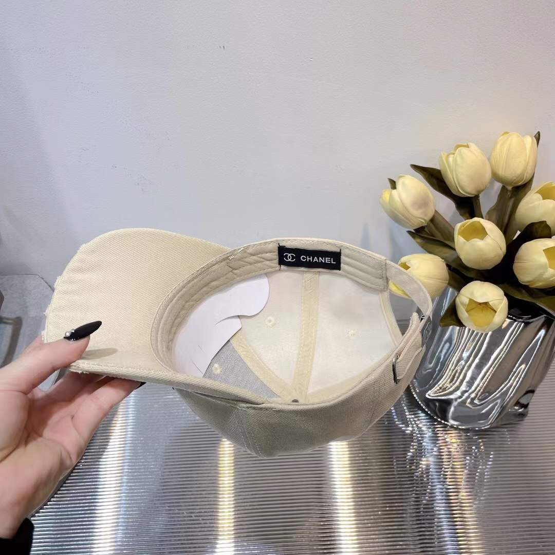 Chanel baseball cap embroidered black CC logo on the front and "CHANEL" text on the brim