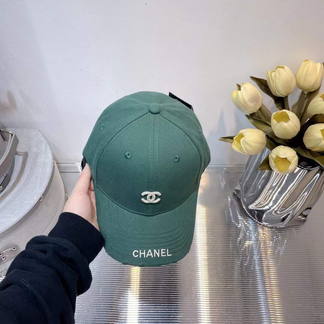 Chanel baseball cap with the brand's logo and name embroidered on the front