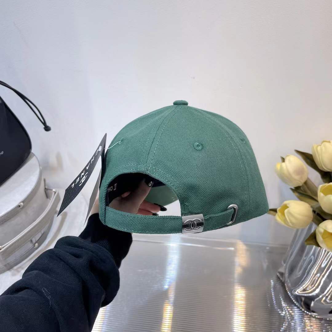 Chanel baseball cap with the brand's logo and name embroidered on the front