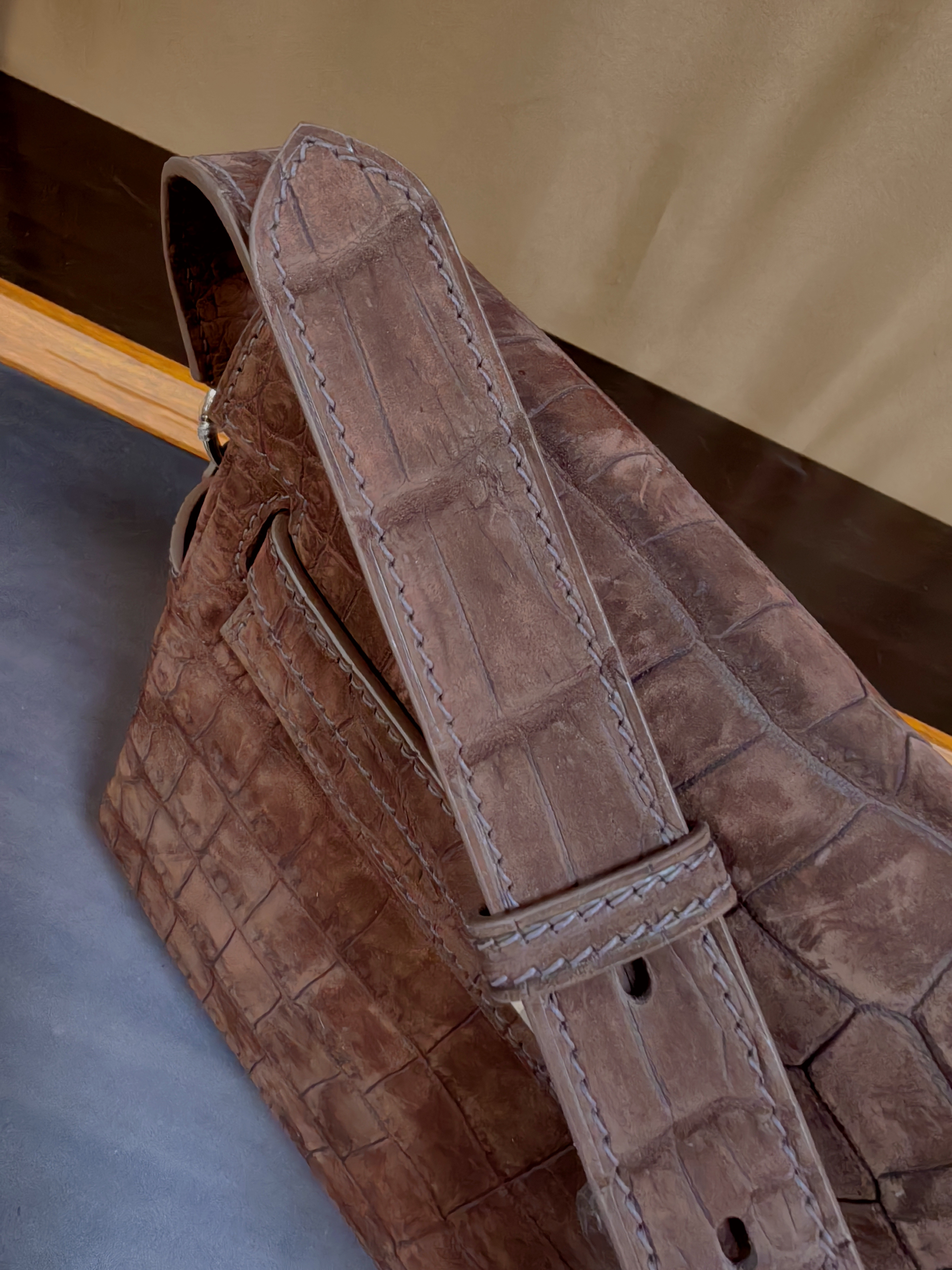 Hermès Kelly Pochette clutch bag in Gris Elephant matte alligator or crocodile leather with palladium hardware.