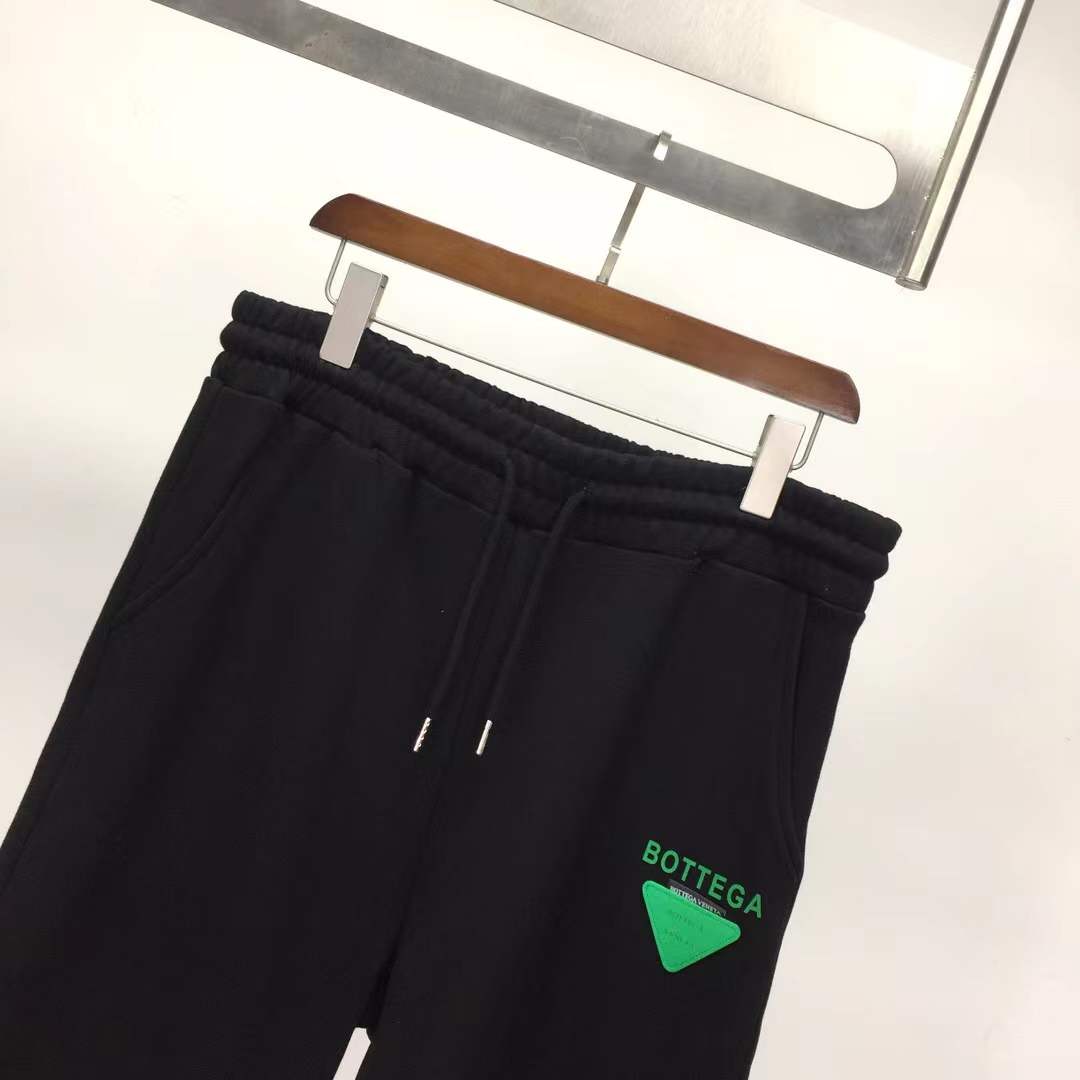 Bottega Veneta black cotton jersey drawstring shorts.