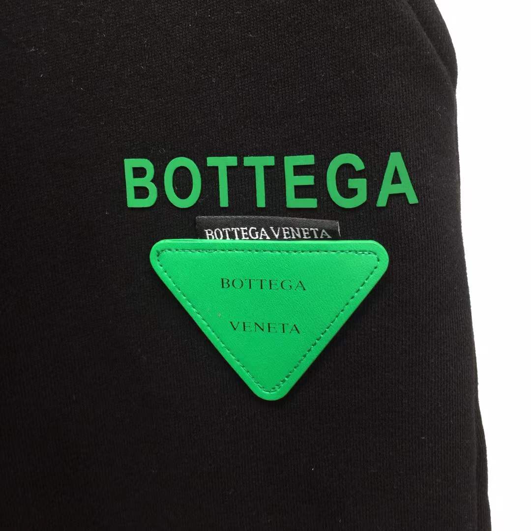 Bottega Veneta black cotton jersey drawstring shorts.