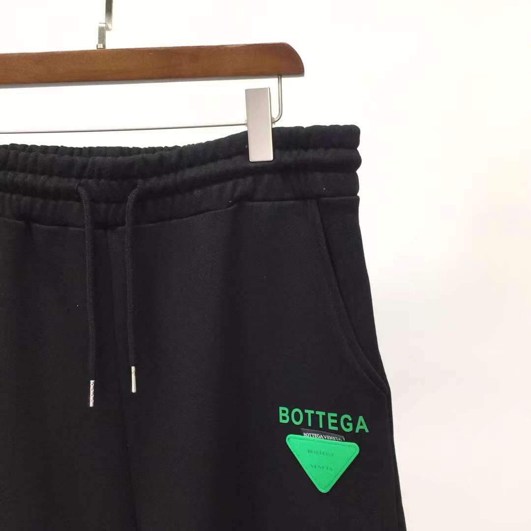 Bottega Veneta black cotton jersey drawstring shorts.