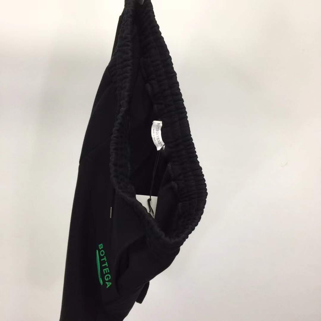 Bottega Veneta black cotton jersey drawstring shorts.