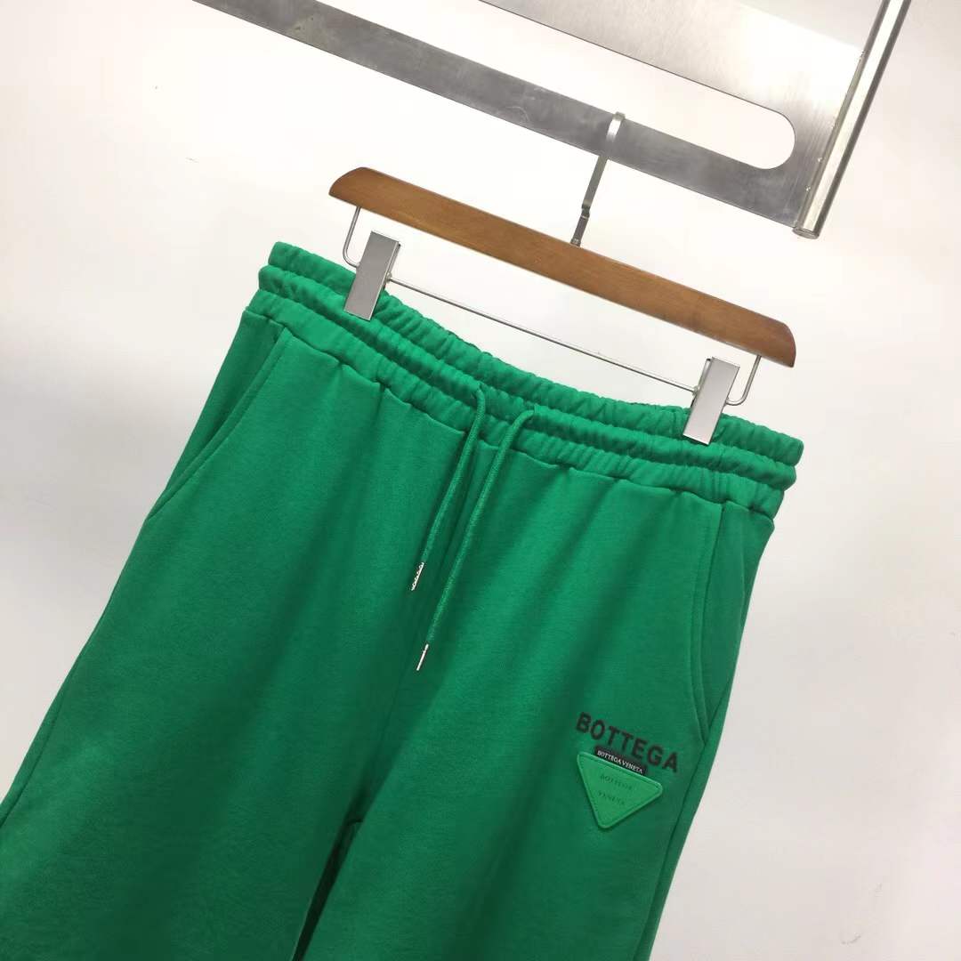 Bottega Veneta green cotton jersey drawstring shorts.