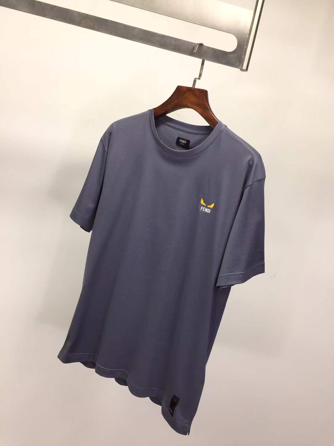 Fendi crew-neck t-shirt with the iconic "Bag Bugs" eye motif embroidered on the chest