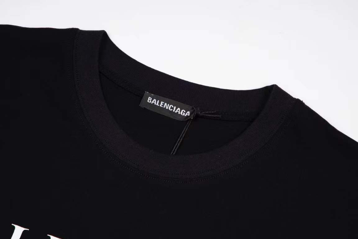 Balenciaga black cotton t-shirt with a blue denim slipper graphic print