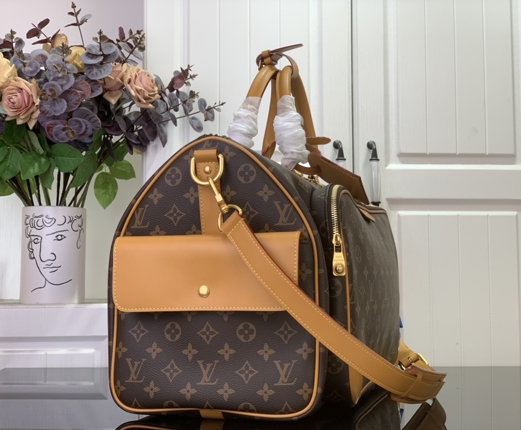 LV Keepall Cargo 50 bag in Monogram coated canvas with natural-cowhide trim and golden hardware.