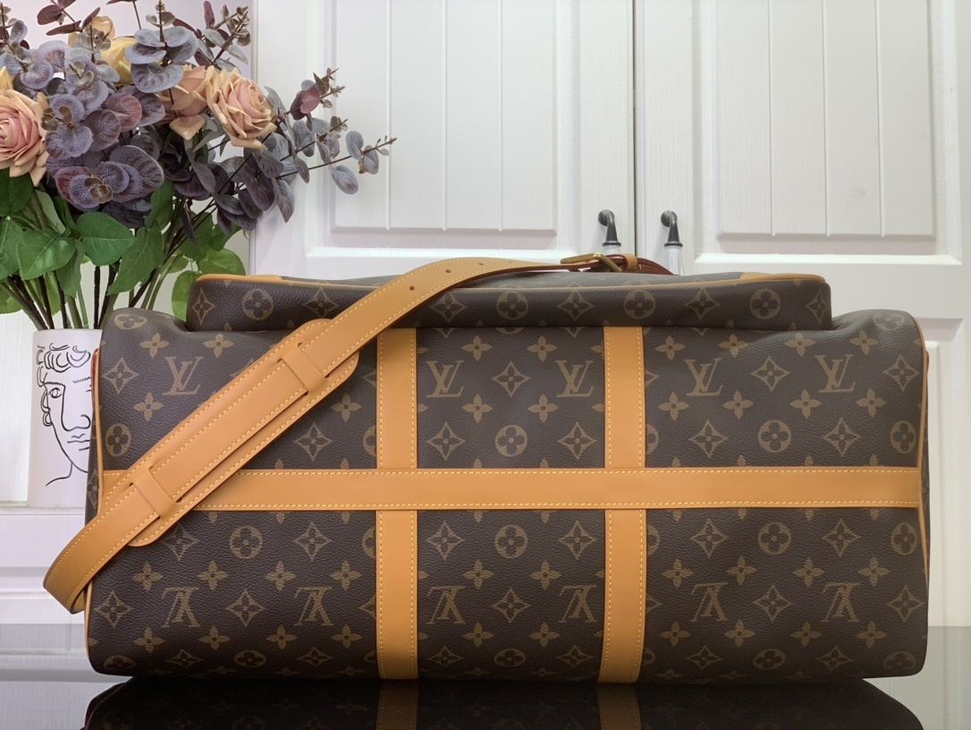 LV Keepall Cargo 50 bag in Monogram coated canvas with natural-cowhide trim and golden hardware.