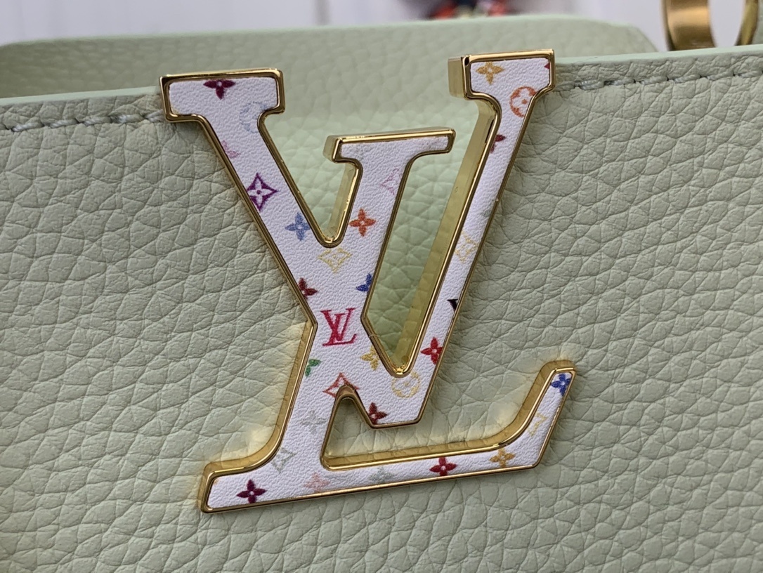 LV x Takashi Murakami Capucines Mini handbag in green Taurillon leather with a multicolor monogram flower tag and an enameled chain strap