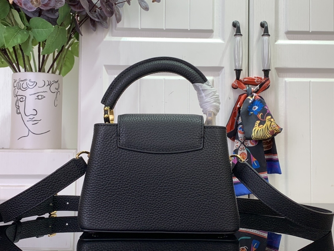 LV x Takashi Murakami Cherry Capucines MM handbag in black Taurillon leather.