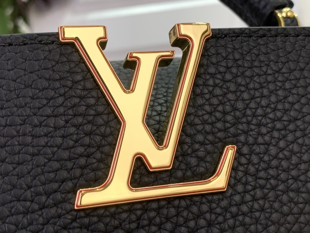 LV x Takashi Murakami Cherry Capucines MM handbag in black Taurillon leather.