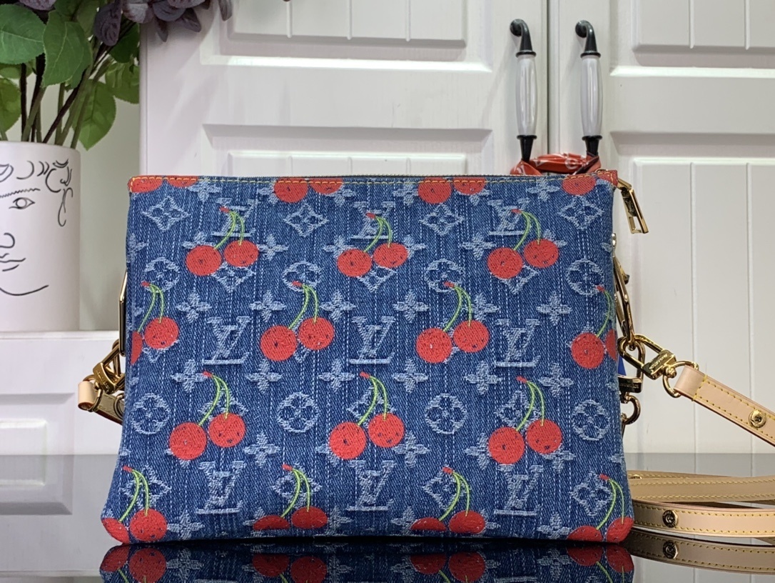 LV x Takashi Murakami Cherry Coussin PM Monogram Denim bag.