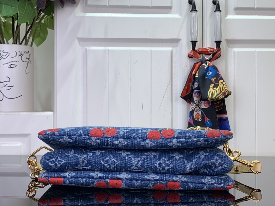 LV x Takashi Murakami Cherry Coussin PM Monogram Denim bag.