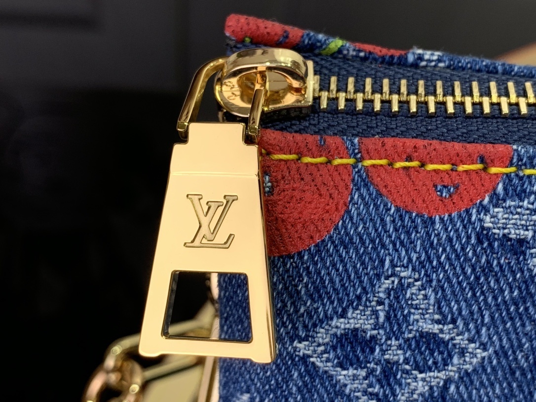 LV x Takashi Murakami Cherry Coussin PM Monogram Denim bag.