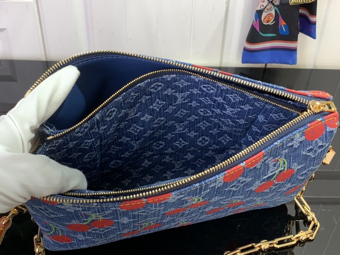 LV x Takashi Murakami Cherry Coussin PM Monogram Denim bag.