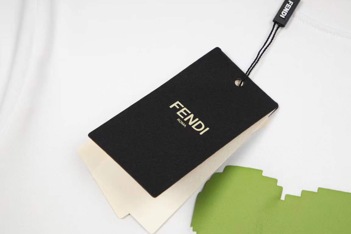 Fendi kids' white cotton t-shirt with a green teddy bear graphic print