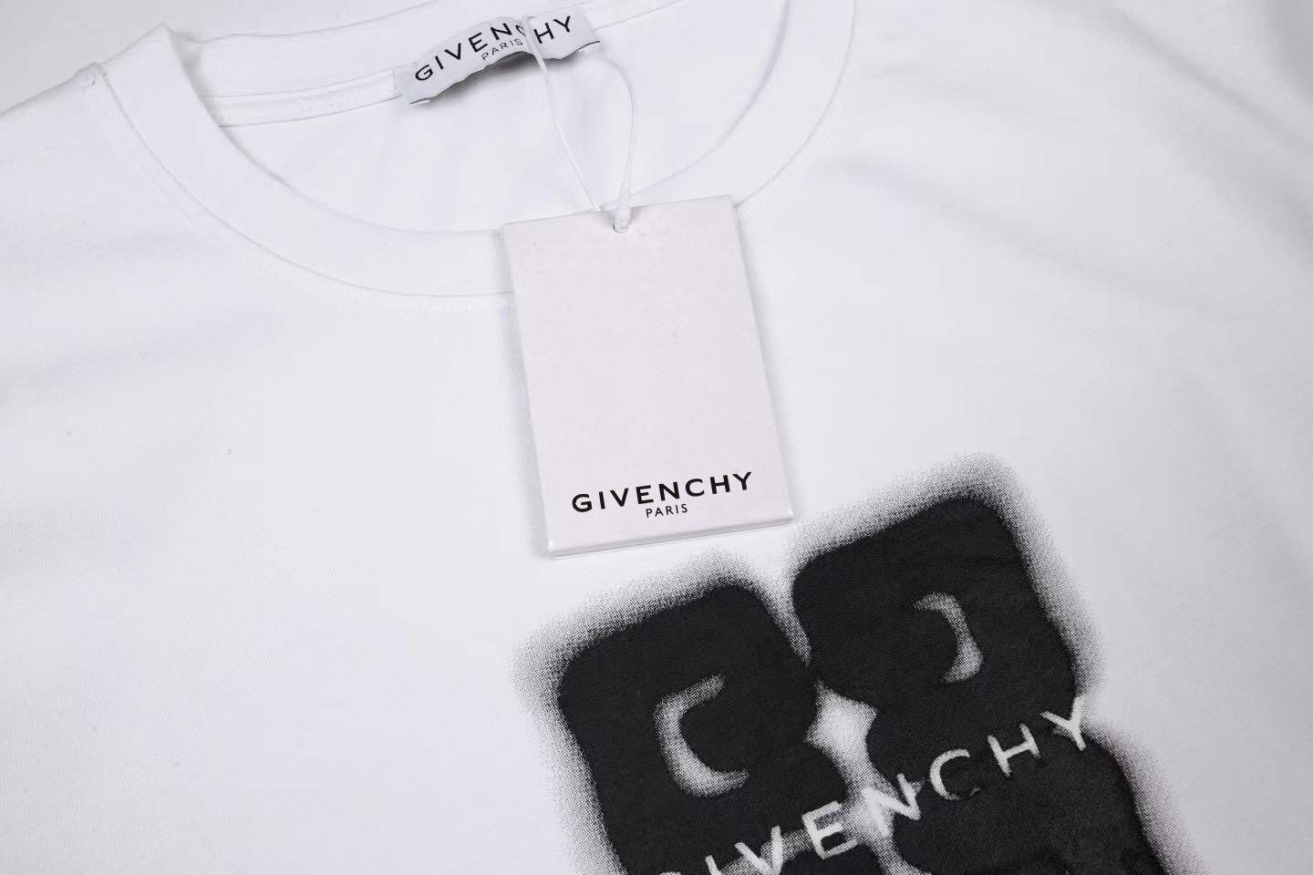 Givenchy 4G Stars cotton T-shirt in white with a black flocked logo