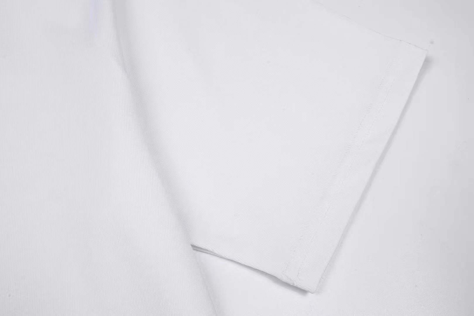 Givenchy 4G Stars cotton T-shirt in white with a black flocked logo