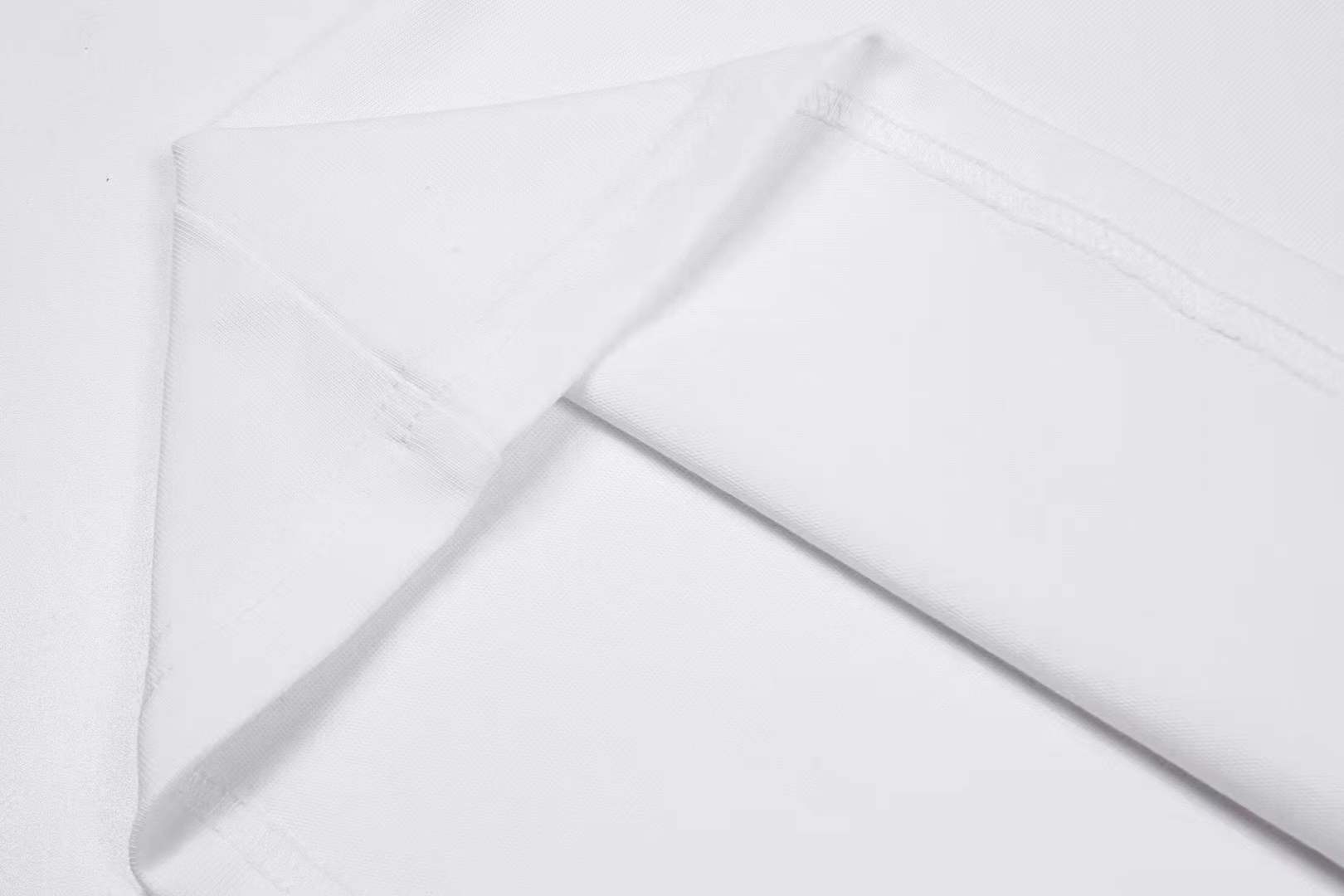 Givenchy 4G Stars cotton T-shirt in white with a black flocked logo