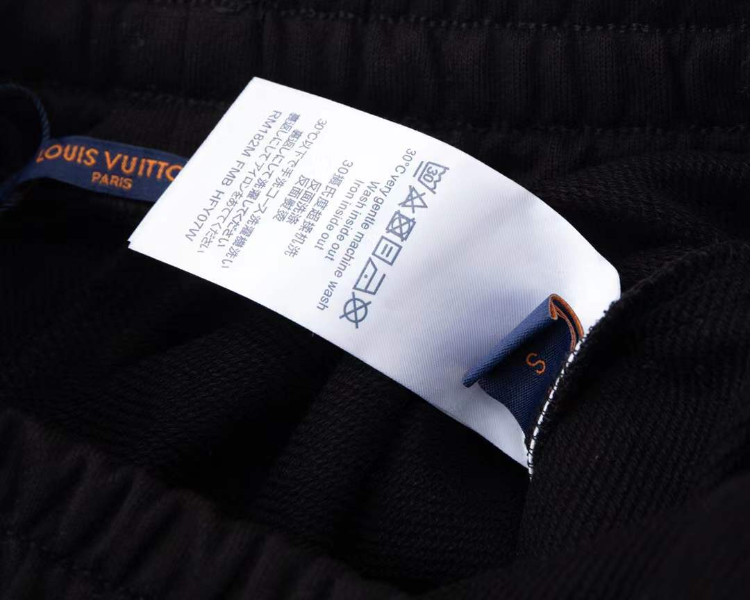 LV black pair of Reason Clothing Men's Legend Chenille Patch Shorts