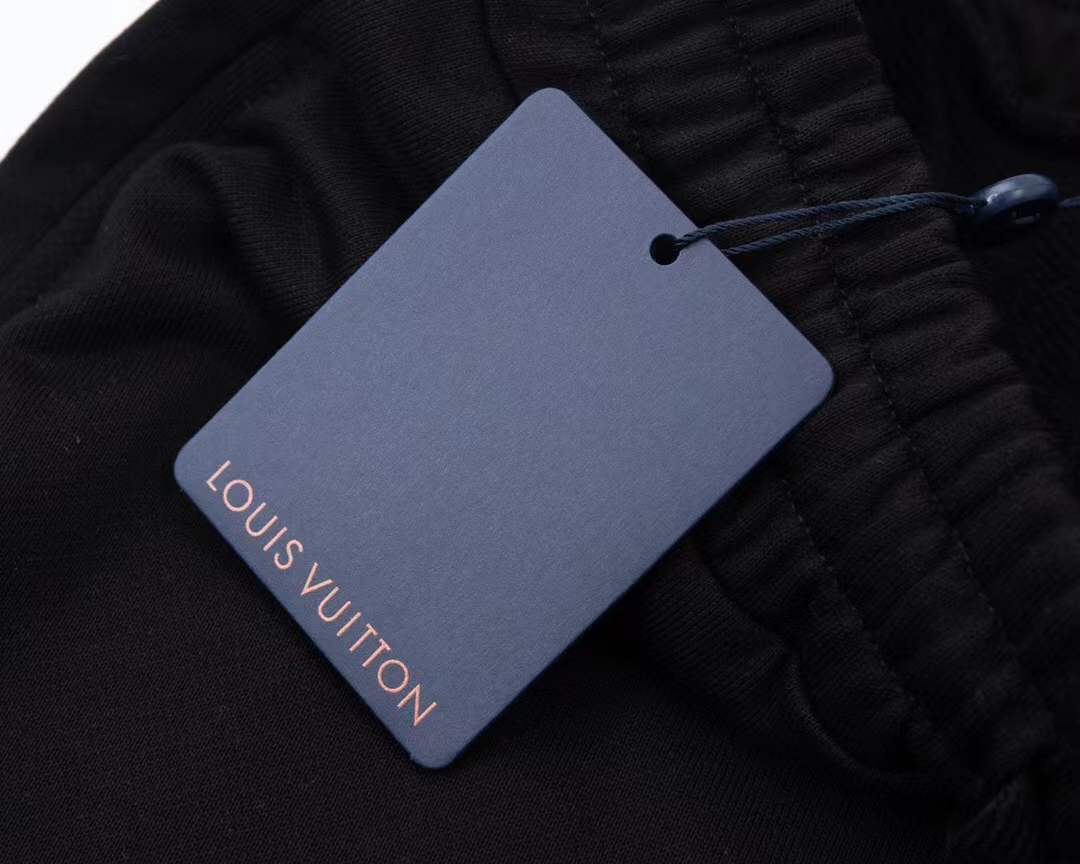 LV black pair of Reason Clothing Men's Legend Chenille Patch Shorts