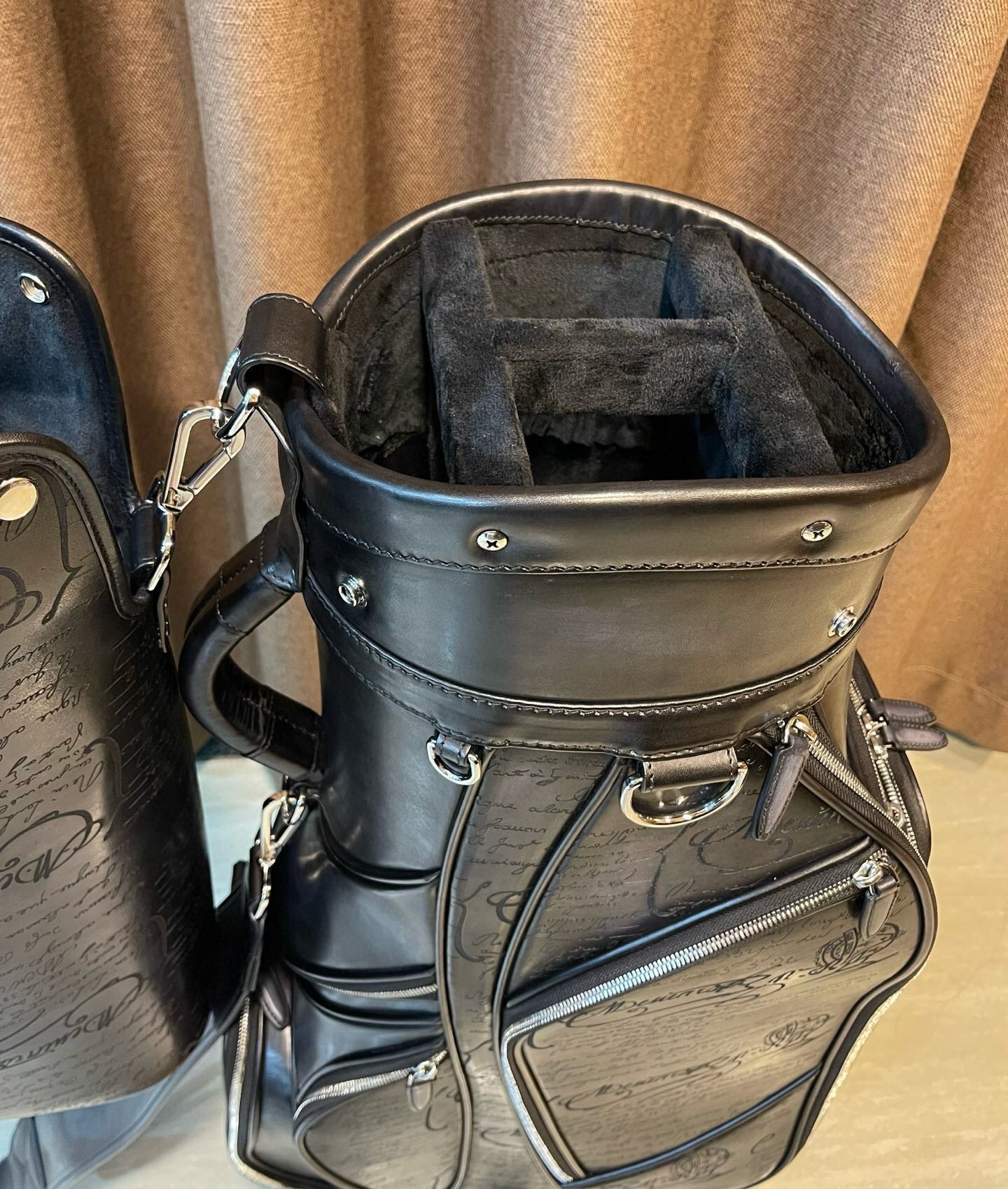 vintage Miller black leather golf bag with a carry strap