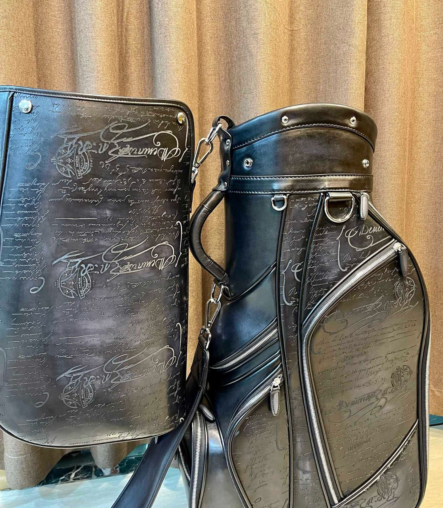 vintage Miller black leather golf bag with a carry strap