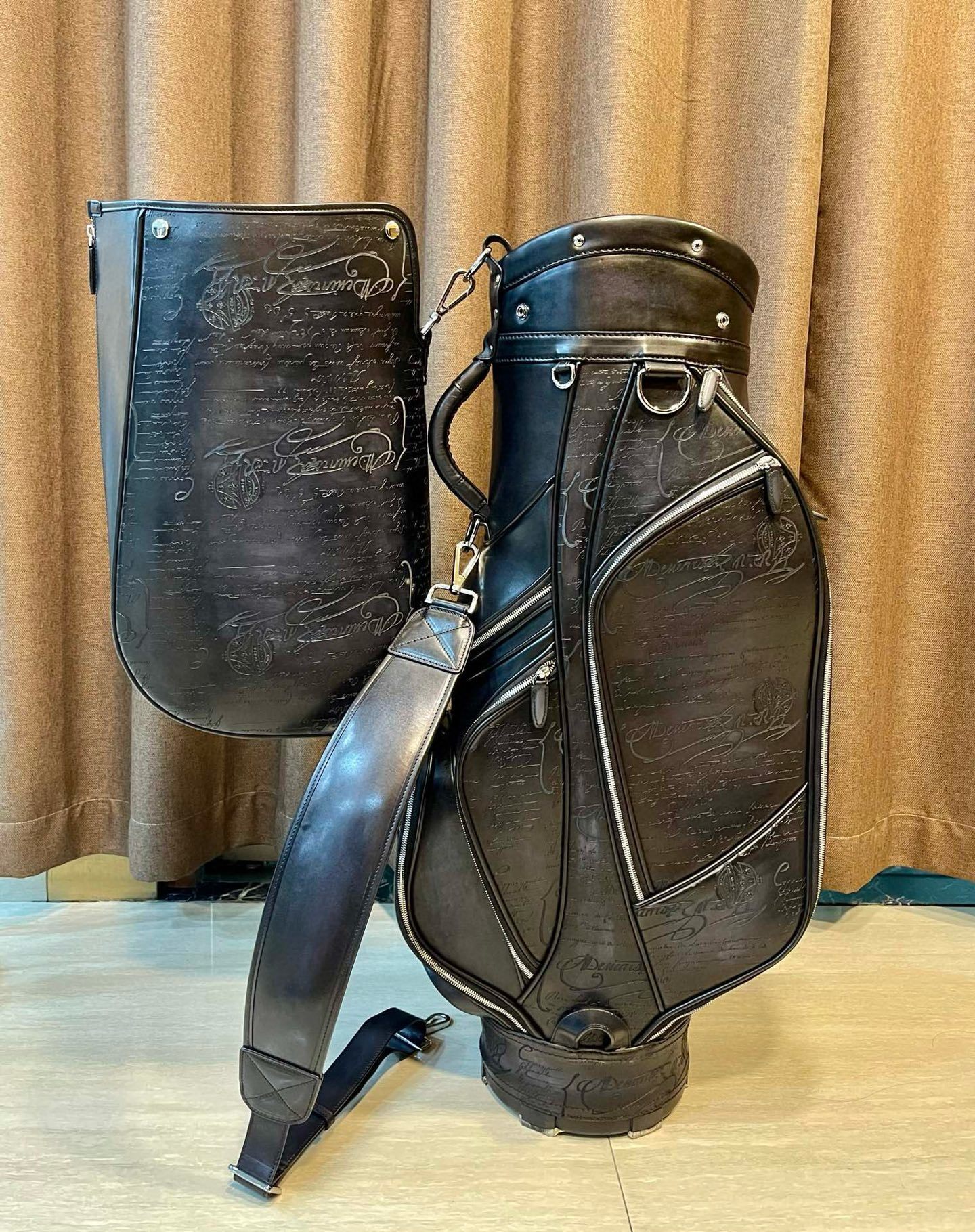 vintage Miller black leather golf bag with a carry strap
