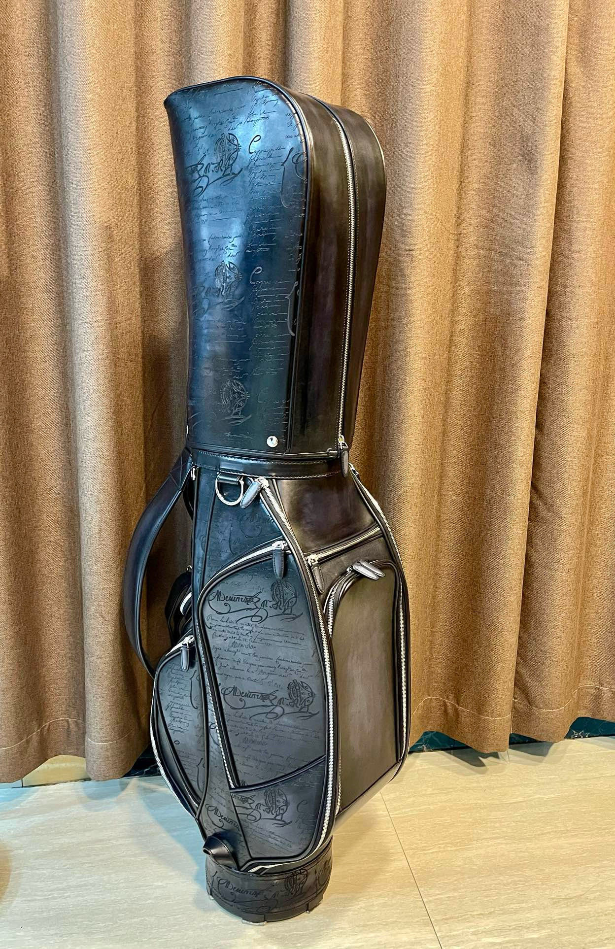 vintage Miller black leather golf bag with a carry strap