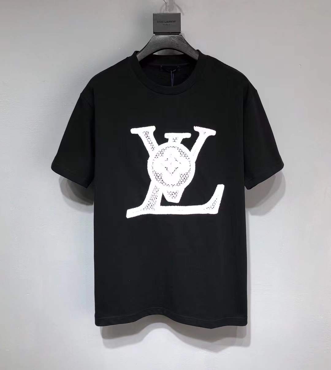 LV black cotton T-shirt featuring a white flocked or printed LV logo
