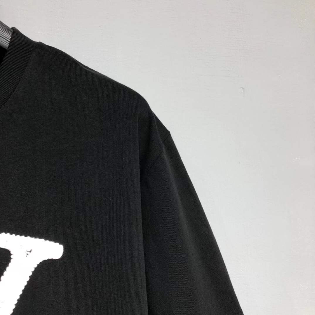 LV black cotton T-shirt featuring a white flocked or printed LV logo