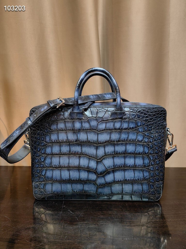 Berluti genuine crocodile or alligator skin leather briefcase.