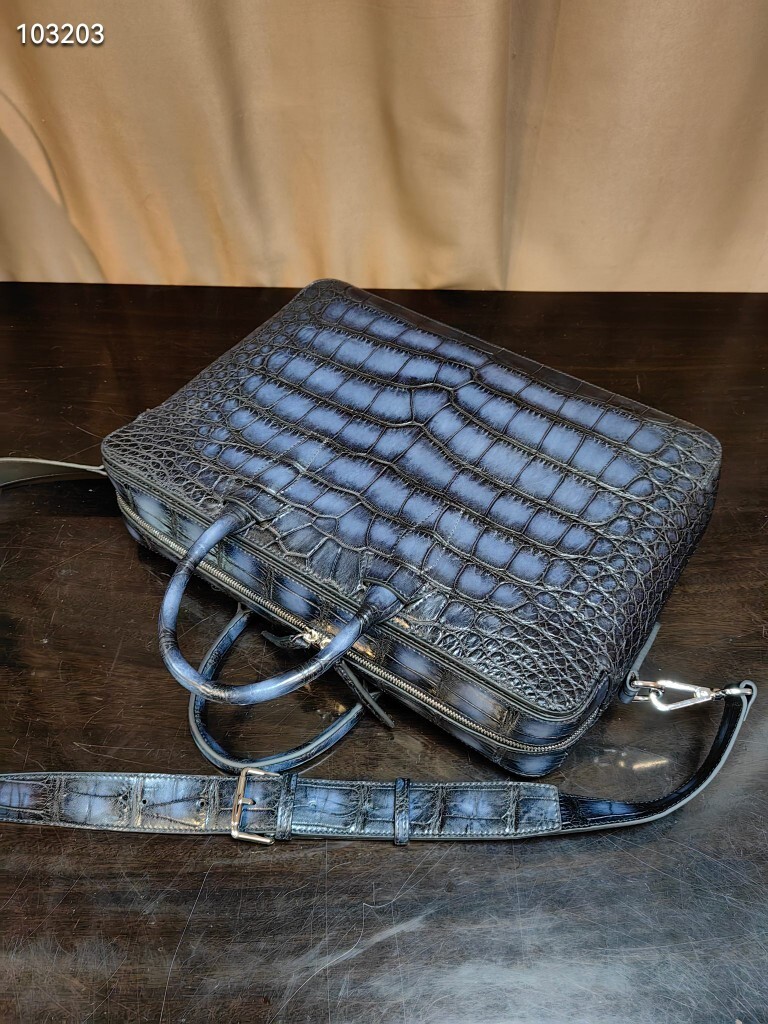 Berluti genuine crocodile or alligator skin leather briefcase.