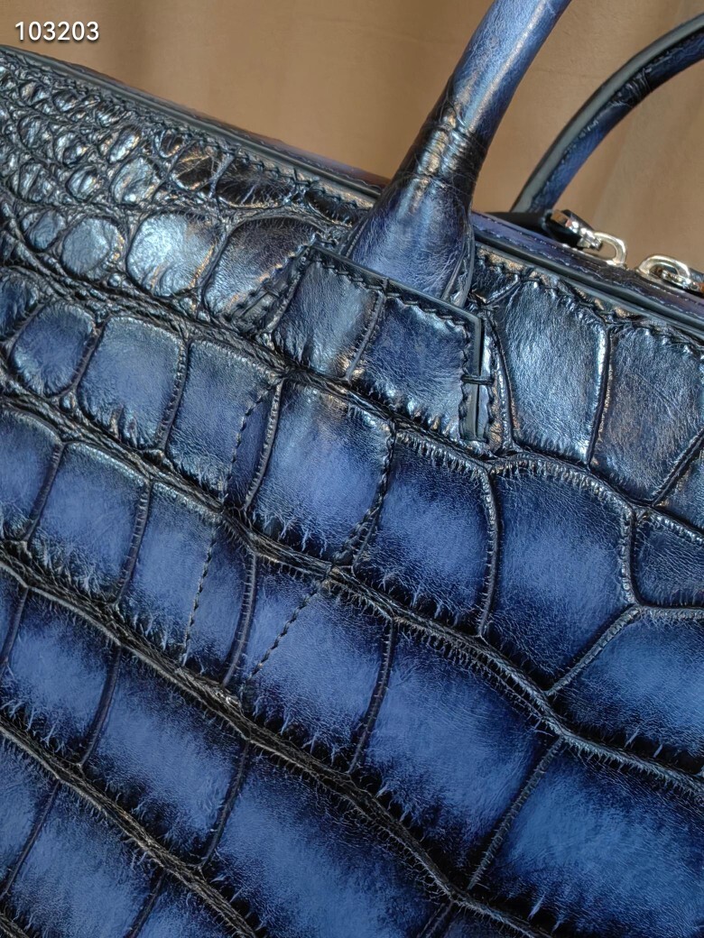 Berluti genuine crocodile or alligator skin leather briefcase.