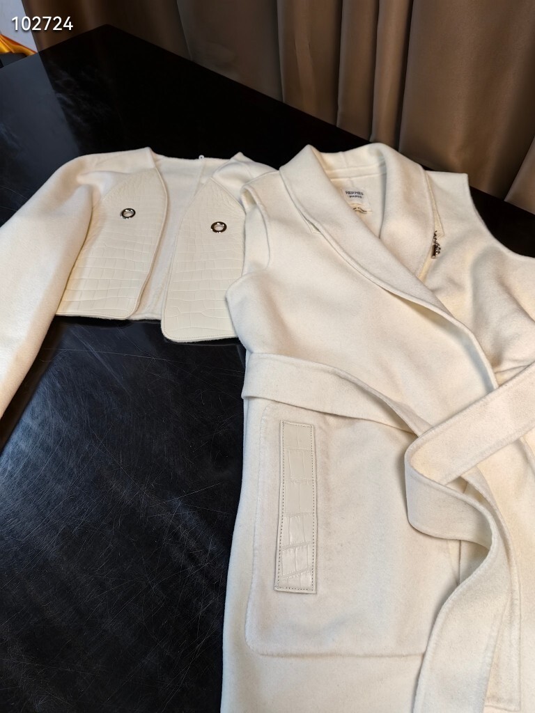 off-white Hermès belted coat with a detachable capelet