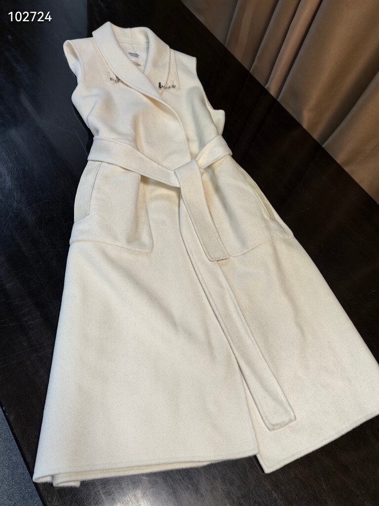 off-white Hermès belted coat with a detachable capelet