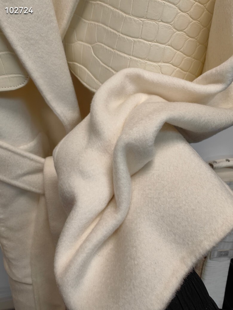 off-white Hermès belted coat with a detachable capelet