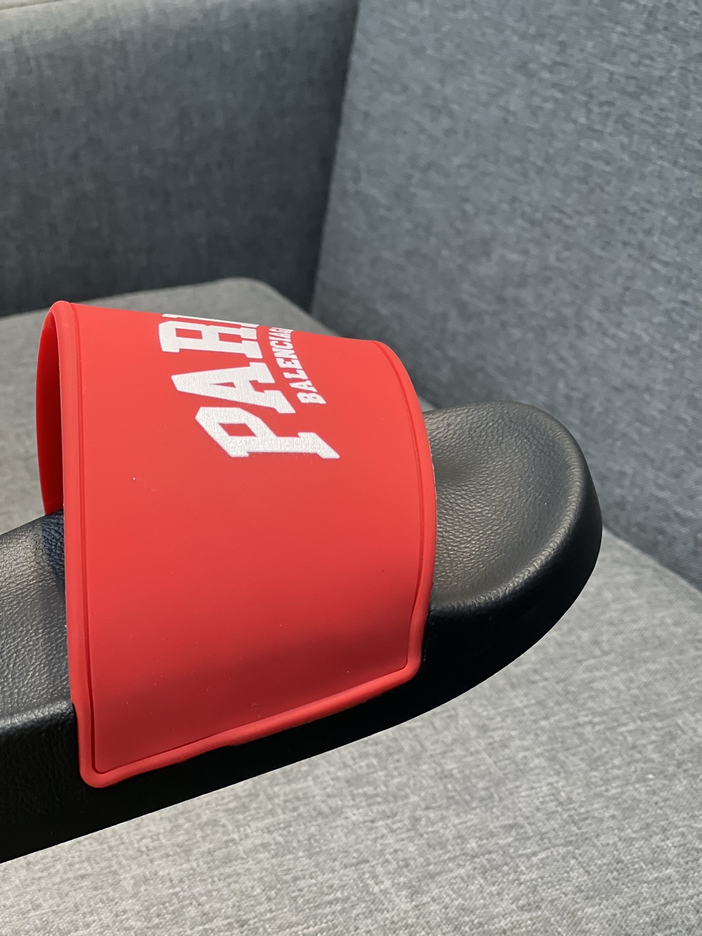 Balenciaga Cities Pool Slide sandals in black with red "PARIS" branding