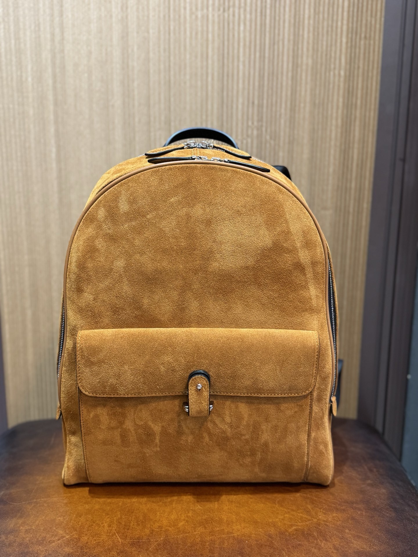Brunello Cucinelli City suede backpack in cognac brown.