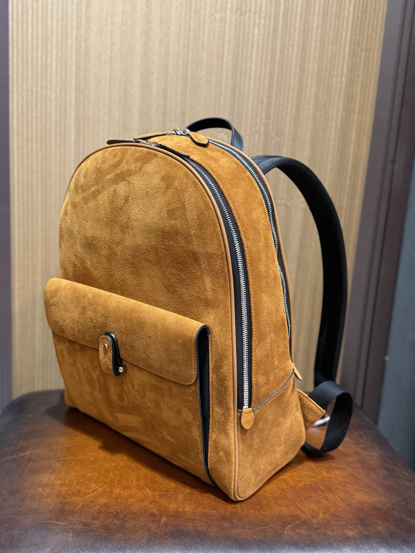 Brunello Cucinelli City suede backpack in cognac brown.