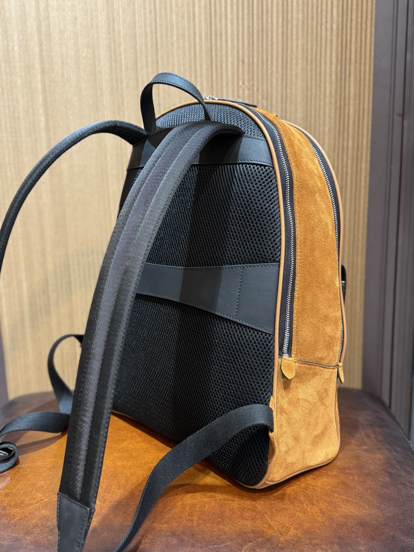 Brunello Cucinelli City suede backpack in cognac brown.