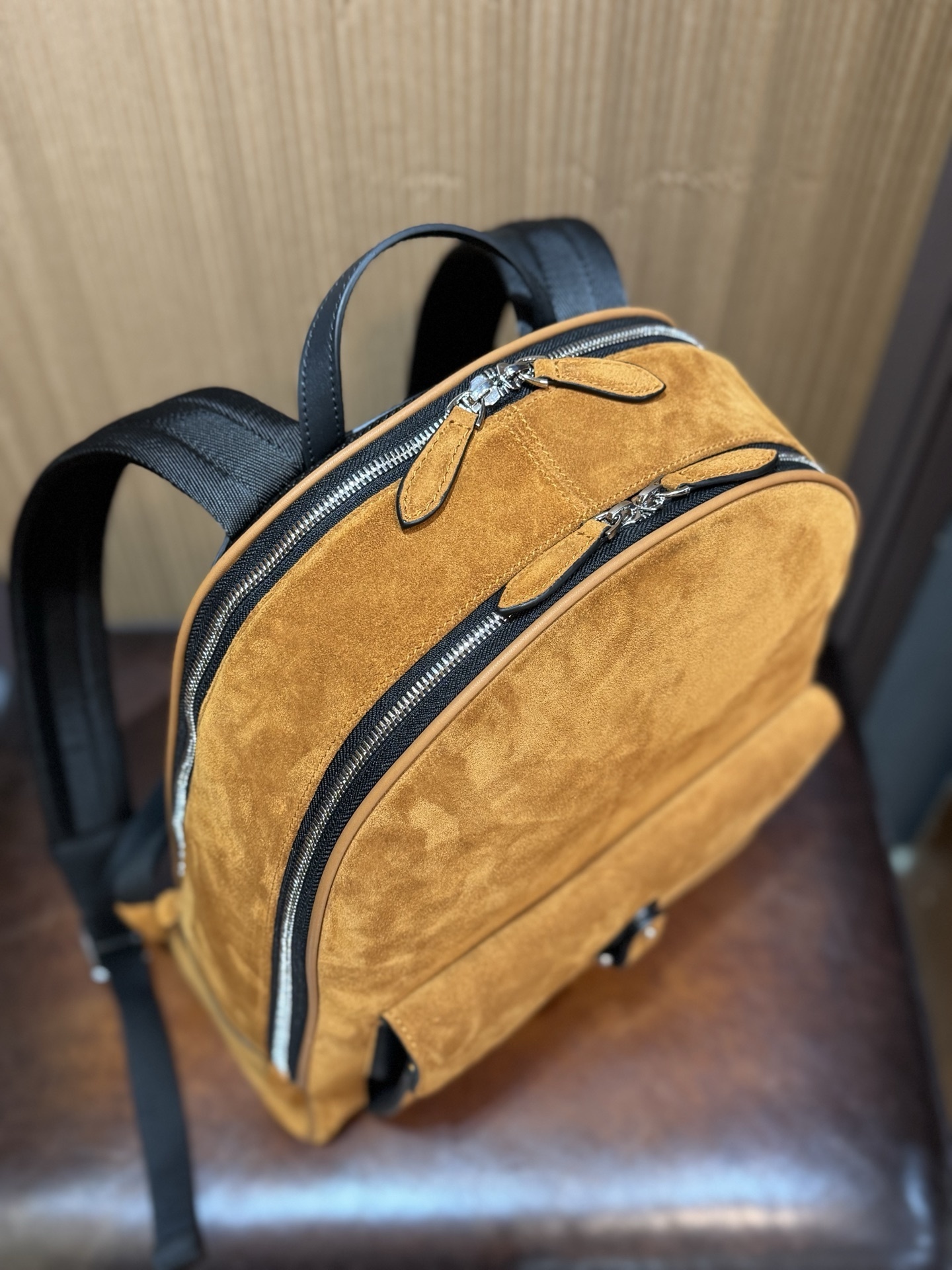 Brunello Cucinelli City suede backpack in cognac brown.