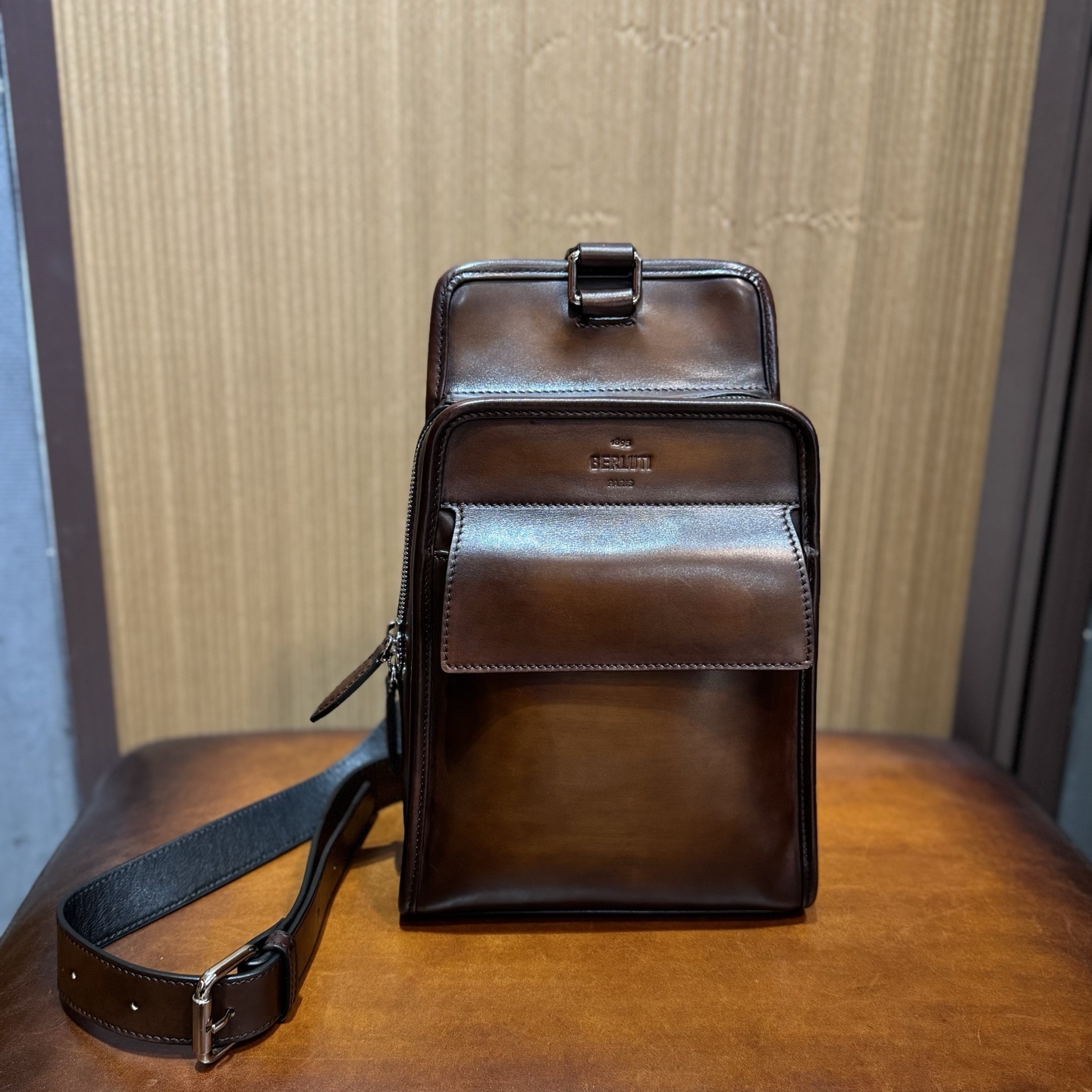 Berluti Périple sling bag in brown Venezia leather