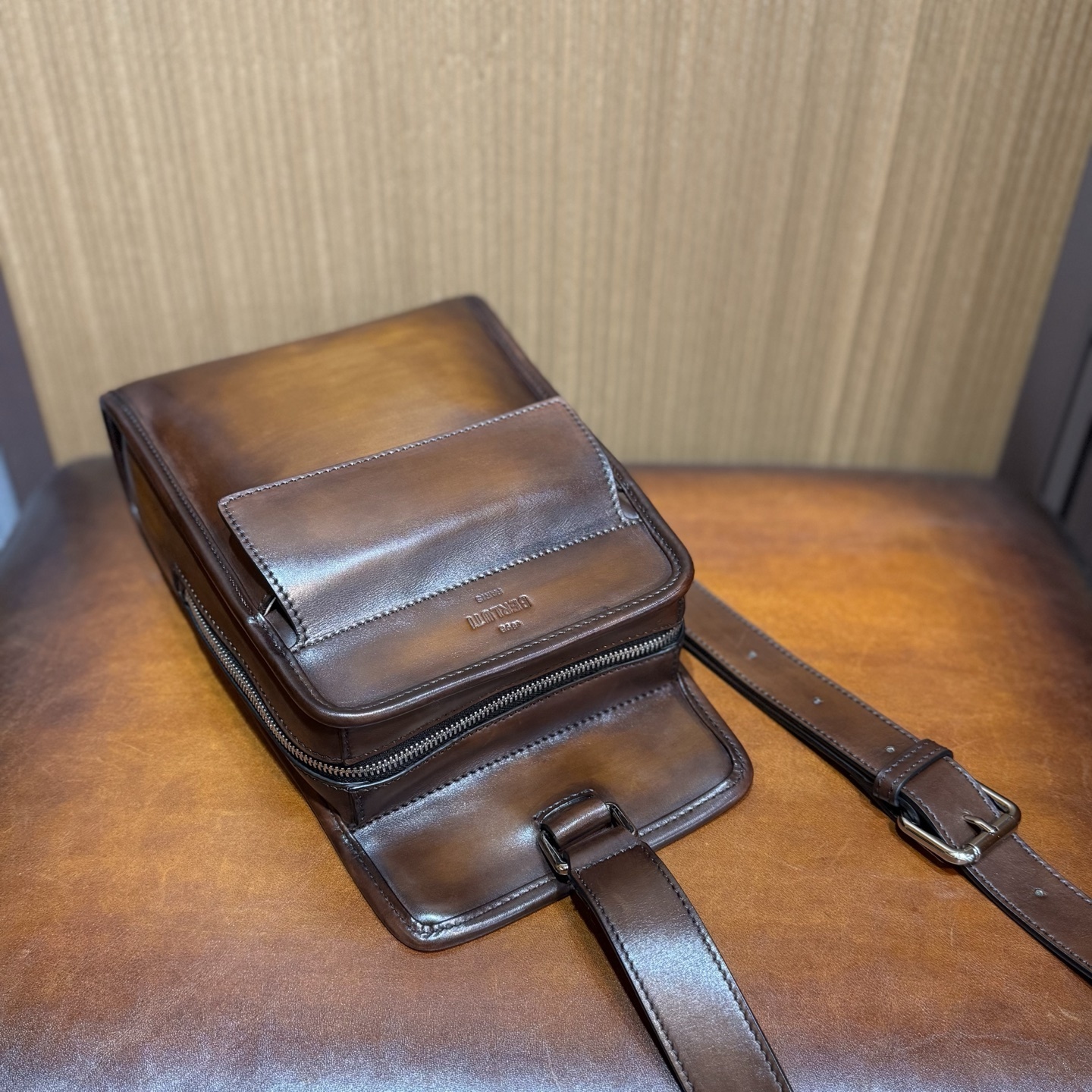 Berluti Périple sling bag in brown Venezia leather