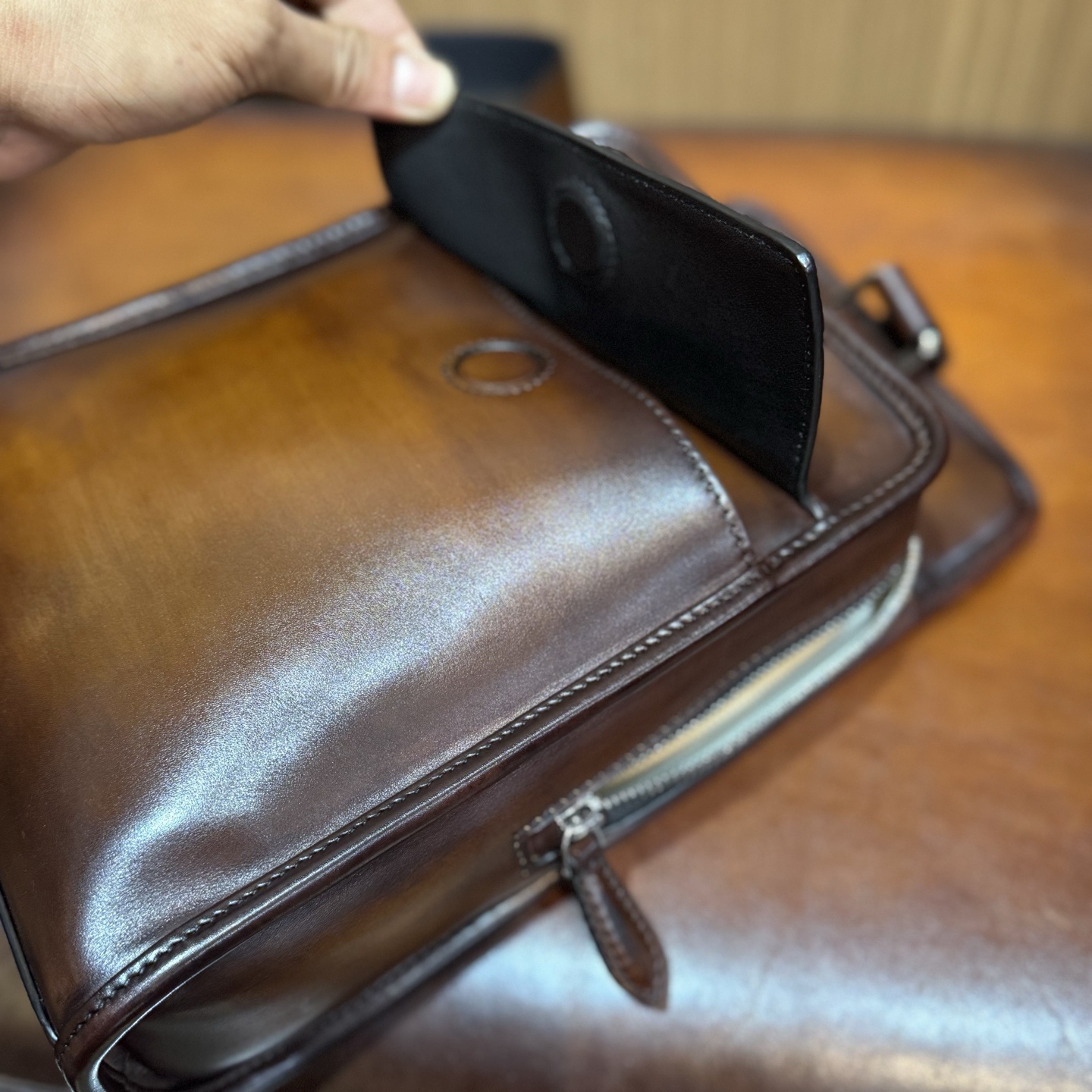 Berluti Périple sling bag in brown Venezia leather