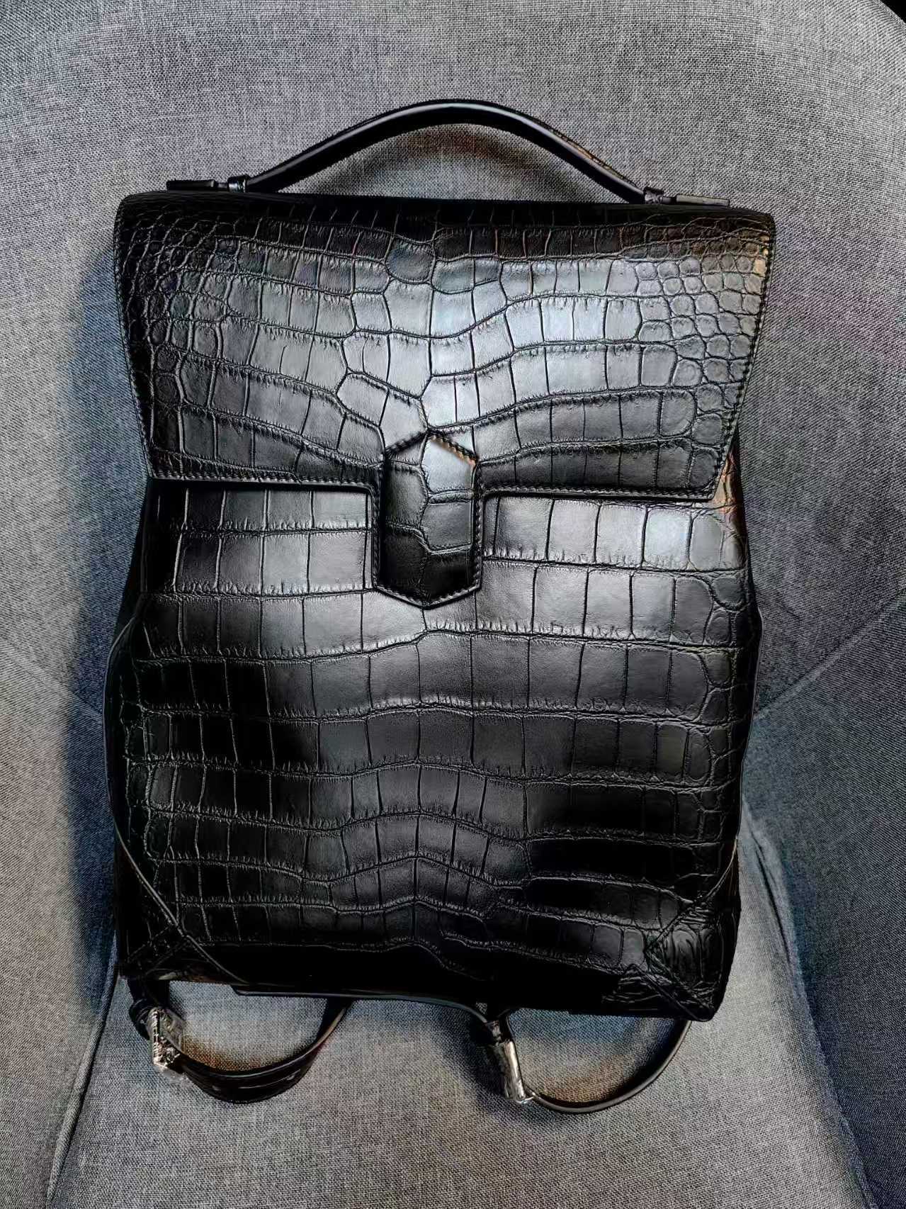 Saint Laurent Sac De Jour crocodile-embossed leather backpack in black