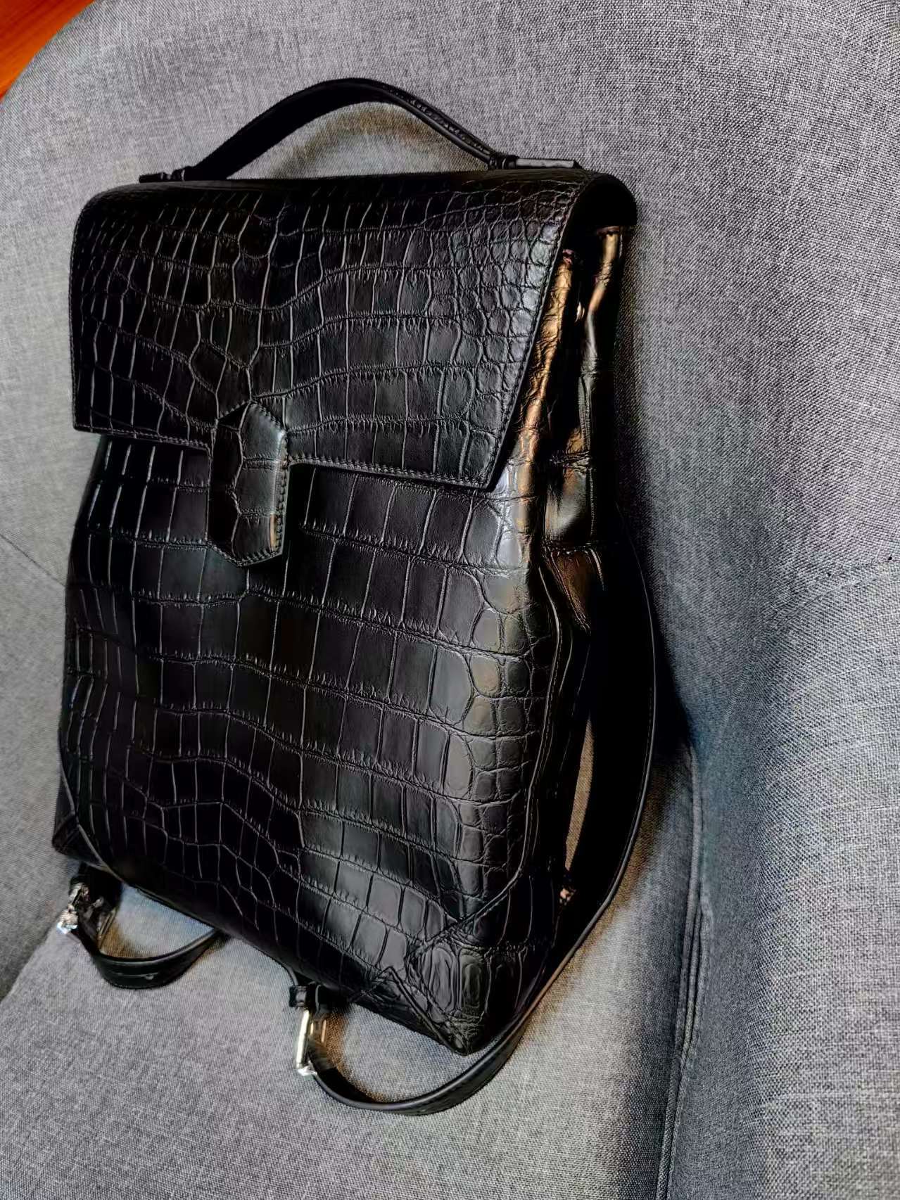 Saint Laurent Sac De Jour crocodile-embossed leather backpack in black