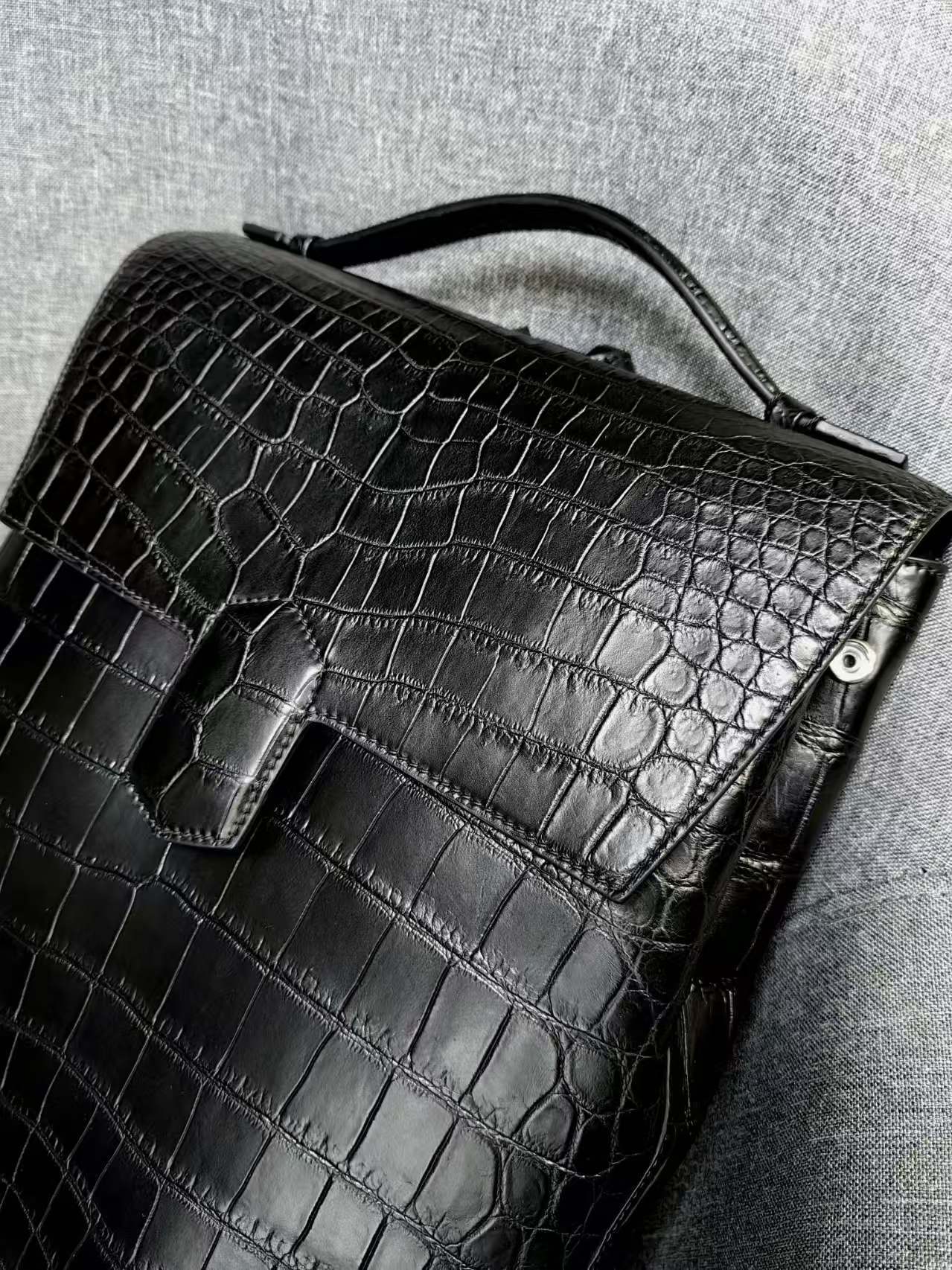 Saint Laurent Sac De Jour crocodile-embossed leather backpack in black